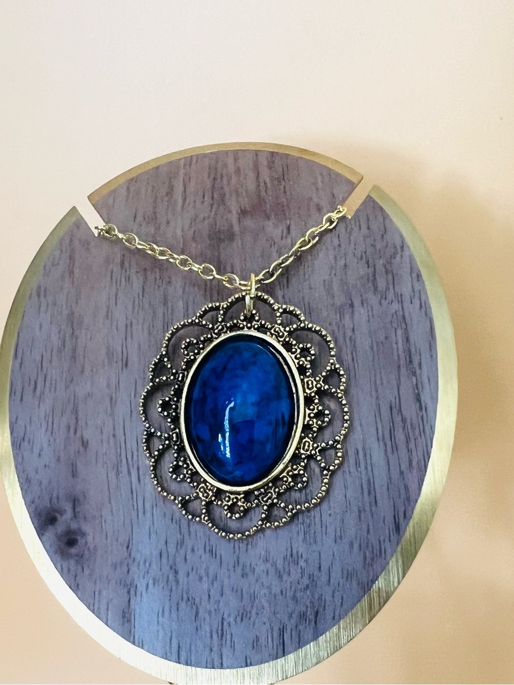 Large oval faux lapis pendant gold tone plus matching necklace